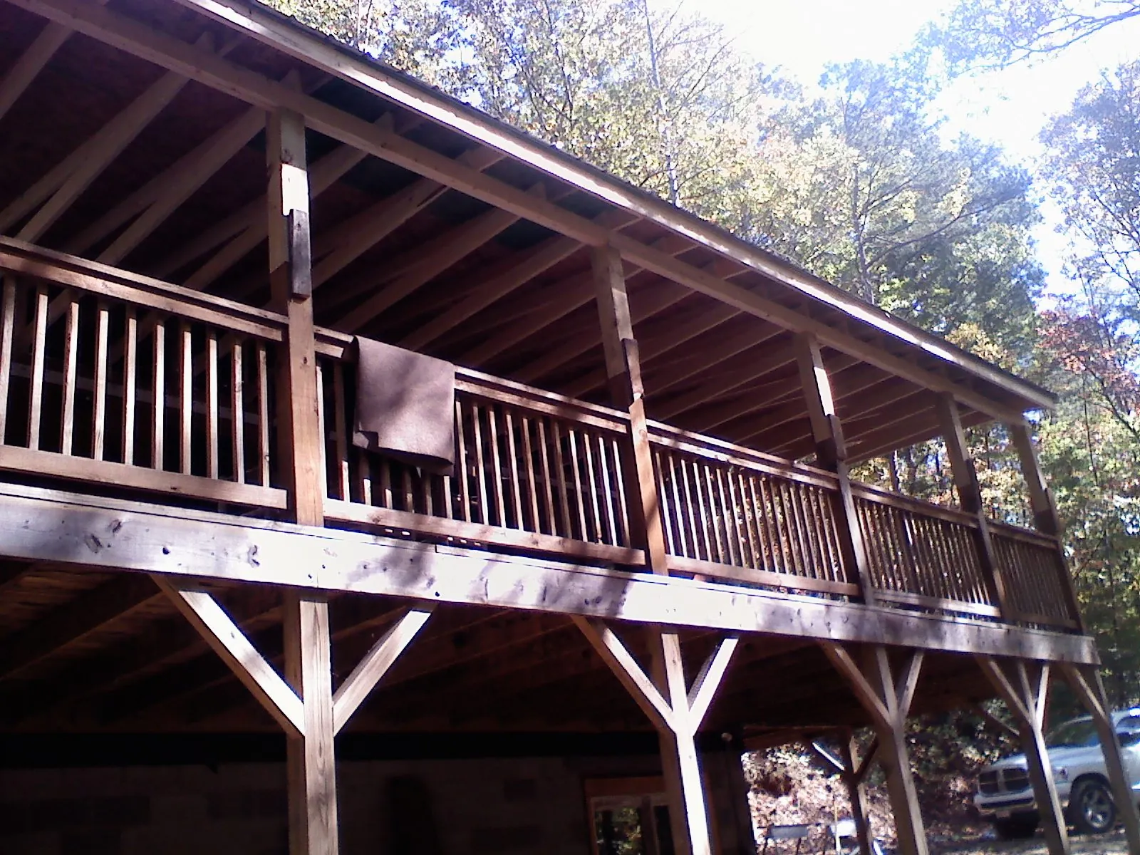 Timber framing under a new elevated porch and deck — Roof Leak Repair in West Middlesex by Roofing Brothers